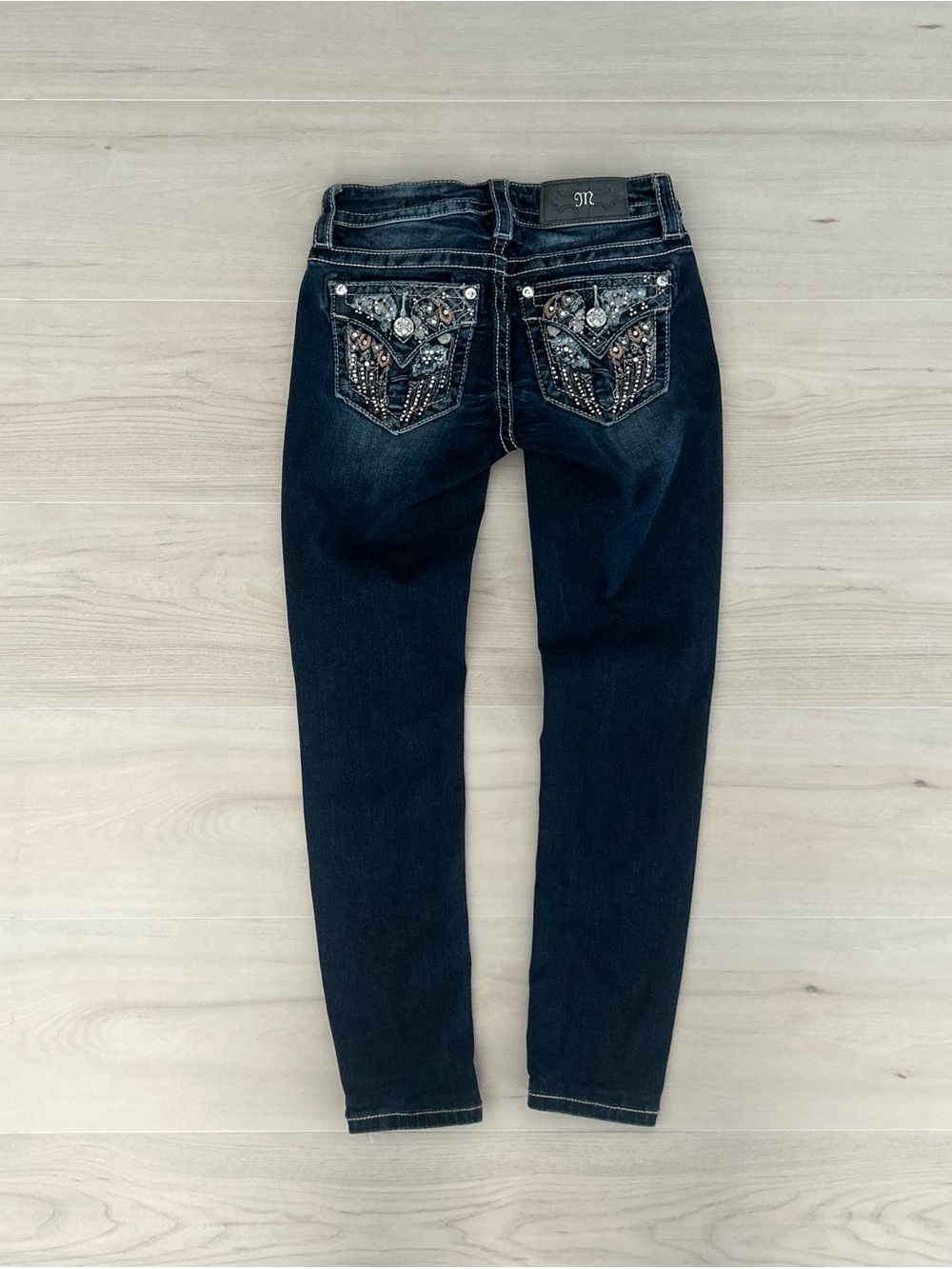dark wash miss me angel wing standard skinny jeans